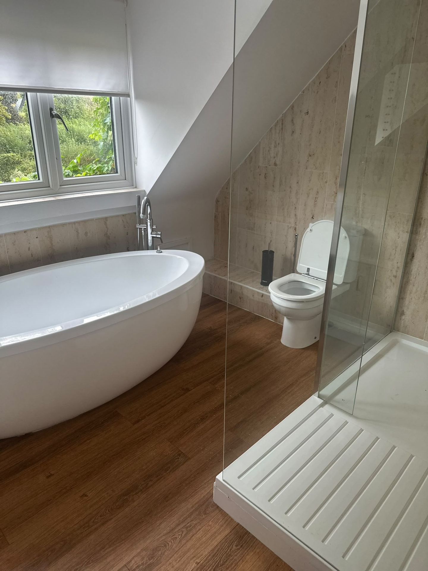 Deep-cleaned bathroom with walk-in shower and toilet
