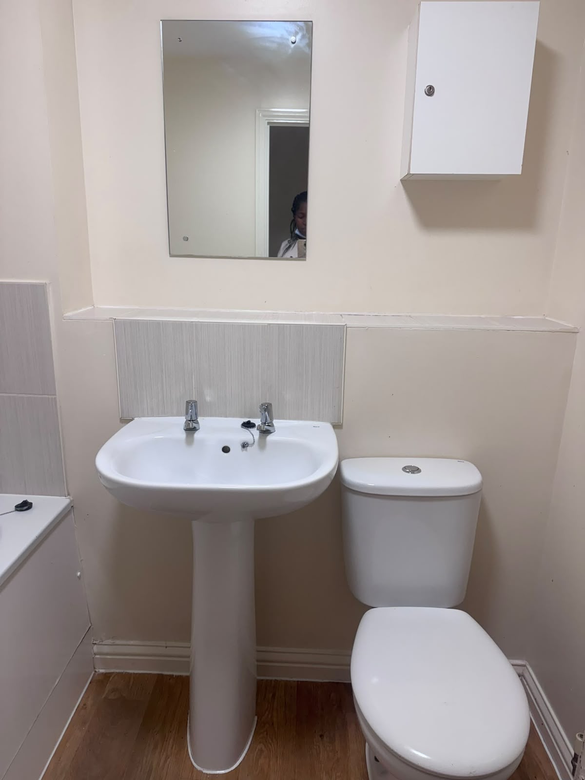 Cleaned bathroom basin, mirror and toilet