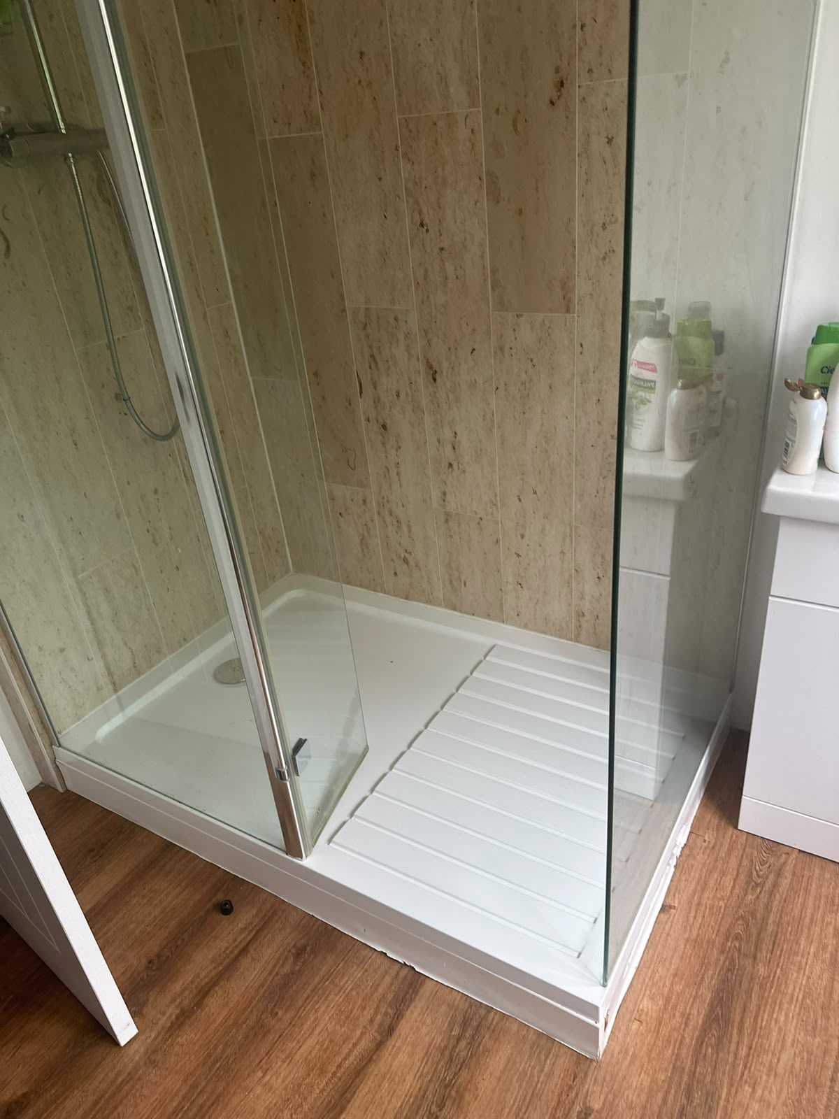 Deep-cleaned shower tray and glass screen