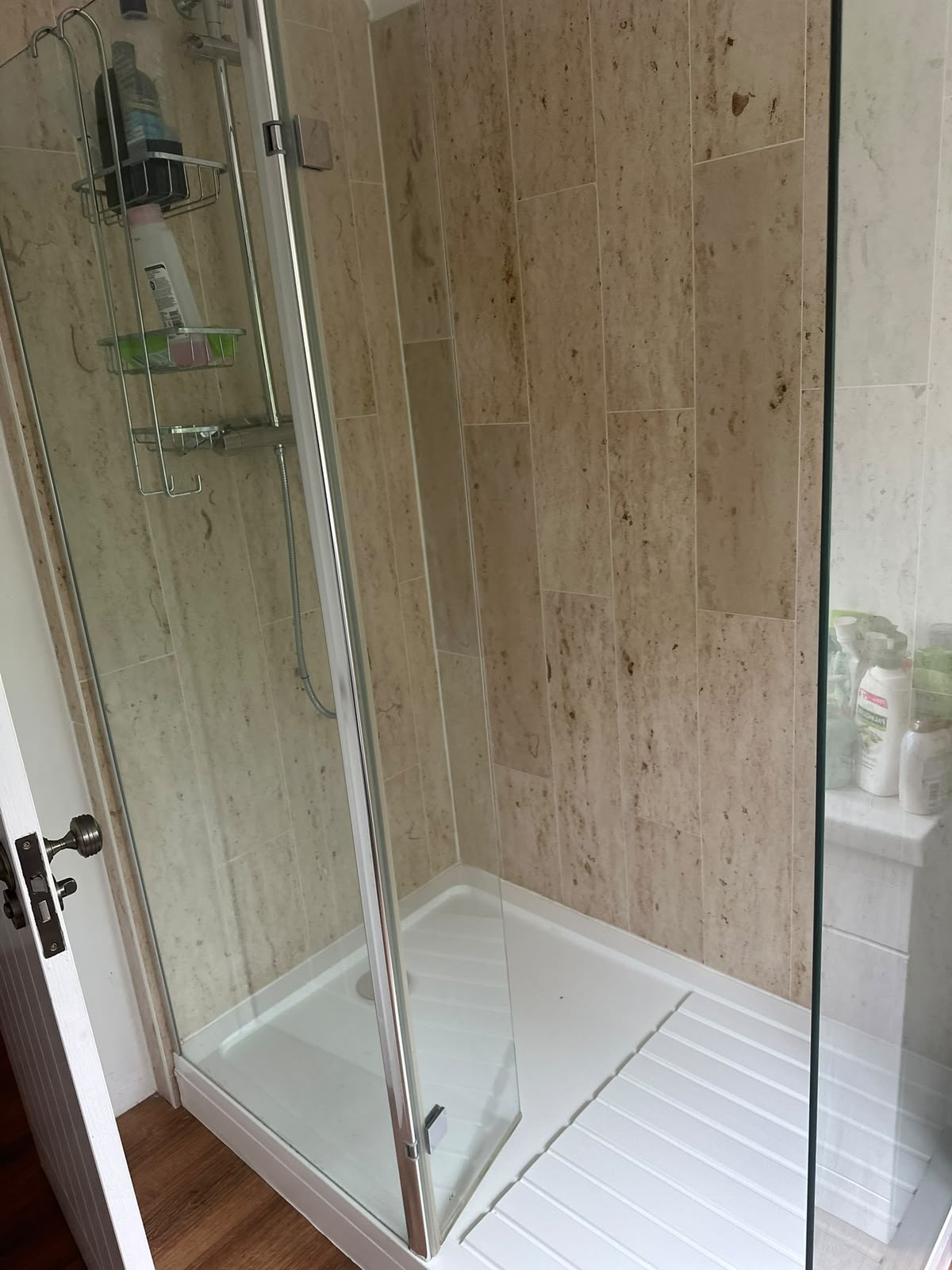 Deep-cleaned shower tiling and glass