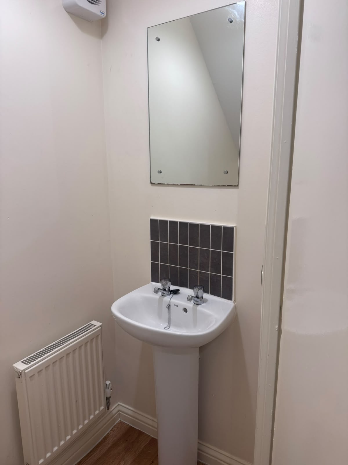 Cleaned downstairs cloakroom basin and mirror